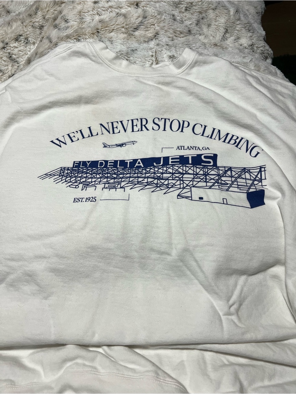 Delta White Tee with Navy 100 Years Anniversary